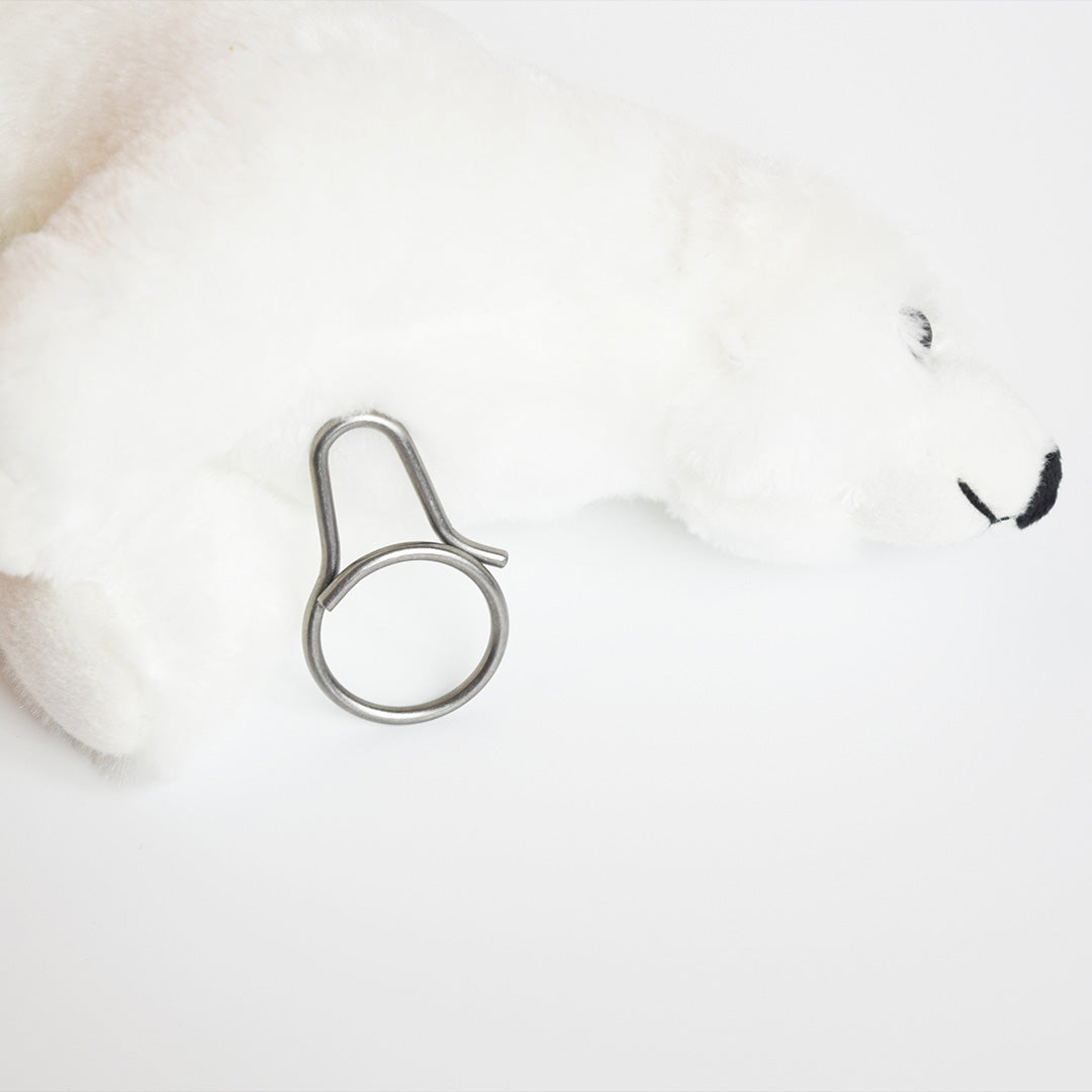Durable and sleek, this 1-piece titanium carabiner is a must-have accessory