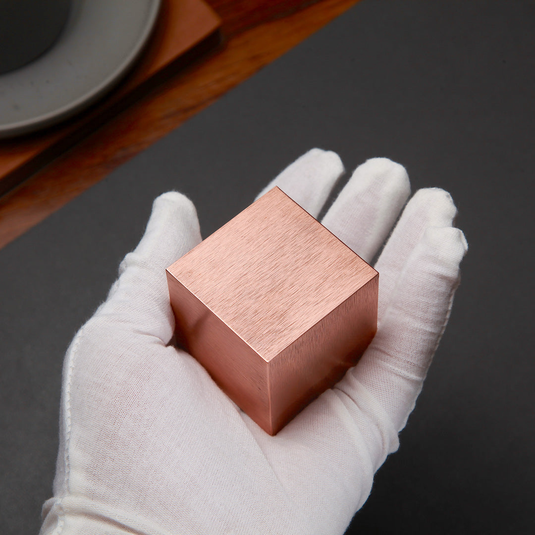 A touch of copper brings warmth to your life - brushed copper cube.