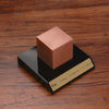 Unique and versatile, this brushed copper cube is perfect for any space