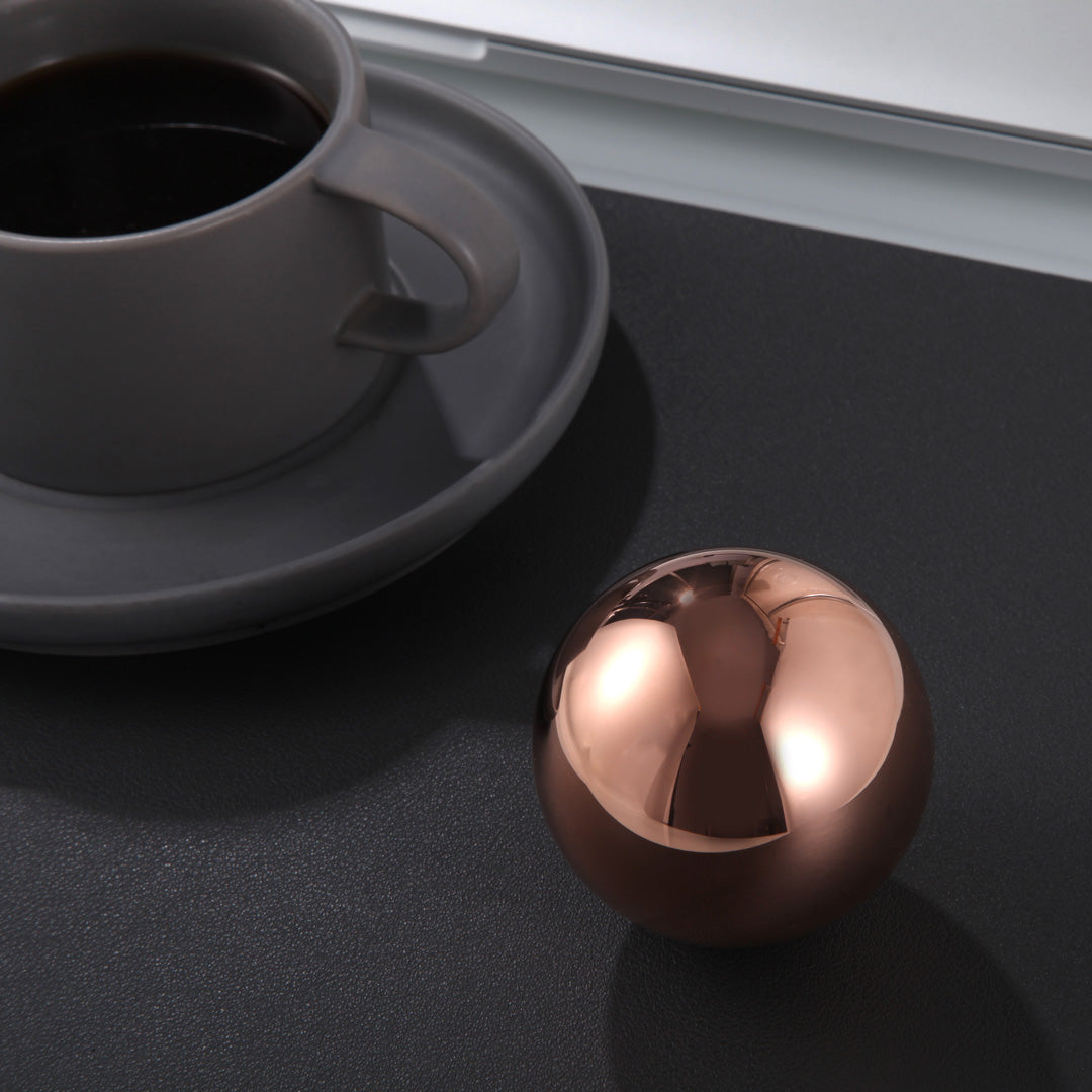 Elevate your decor with this beautiful and heavy 1 kilogram solid copper sphere with mirror finish