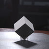Experience the beauty and heft of this 1 kilogram solid Tungsten cube - perfect for display