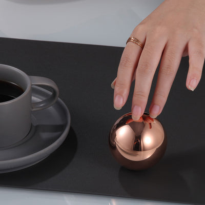 Make a bold statement with this sleek and eye-catching 1 kilogram solid copper sphere with mirror finish